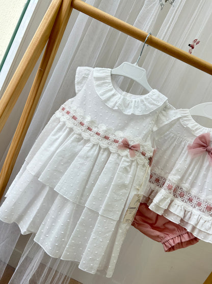 Vestido bebé niña ceremonia plumeti blanco y rosa empolvado Colección Juana de Arco