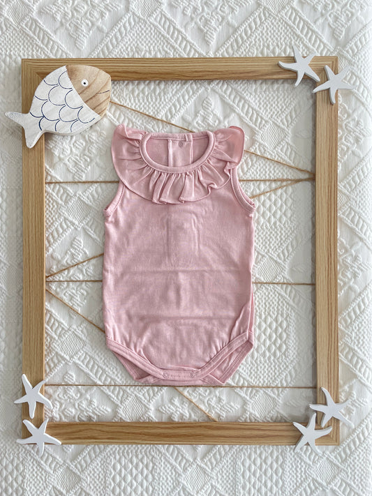 Body sin mangas cuello volante color rosa