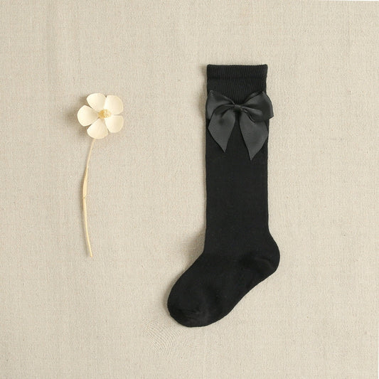 Calcetines altos liso con lazo color negro