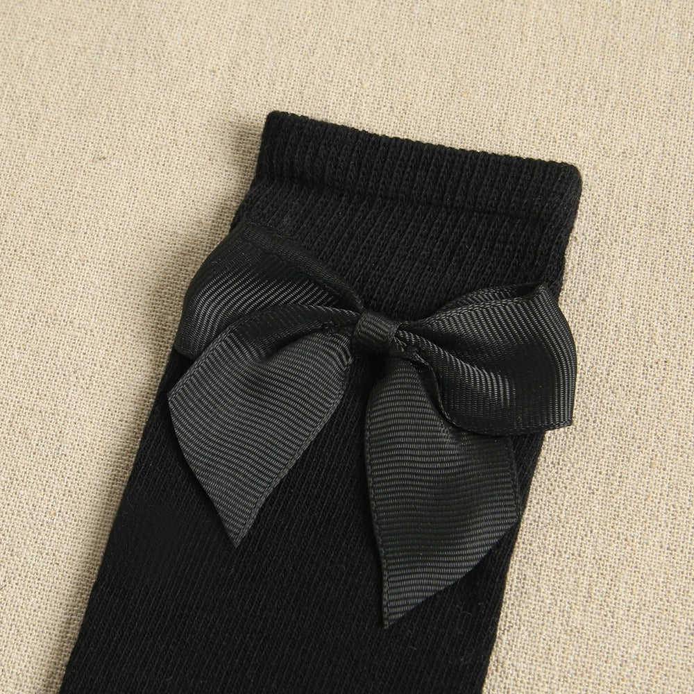 Calcetines altos liso con lazo color negro
